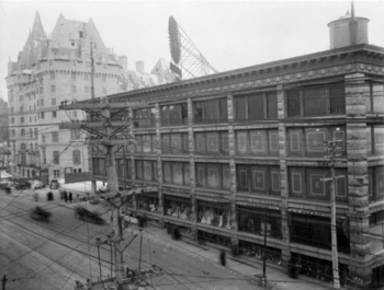 The “Daly Building,” circa 1913, when owned by the Rea Brothers, Library and Archives Canada, Topley Studios, I.D. # 3411920. The Château Laurier Hotel is on the left.
